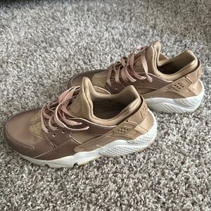 Gold Nike Huaraches sneakers